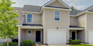 Charming 3BR Townhome with Convenient Main-Level Primary Suite Gallery 1