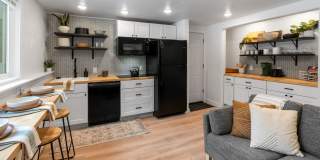 Stylish & Turnkey Furnished 2-BR Daylight Basement Apartment – Utilities + Wi-Fi Included Gallery 1