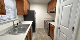 COZY 2/2 SE Townhome with Plank Floors, W/D, Stainless Steel Appliances, Carport, & W/D! Avail NOW for $1495 Gallery 15