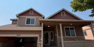 Spacious 4 Bed / 3 Bath Home in Desirable Greeley Neighborhood – Immediate Move-In Gallery 1