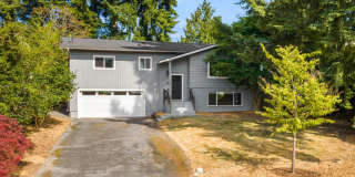 Updated Split-Level Home with Flexible Living Spaces & Backyard Deck Gallery 1