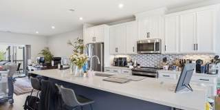 Perfectly positioned near the vibrant shopping and dining destination of One Loudoun, this residence delivers both style and accessibility. Perfectly positioned near the vibrant shopping and dining destination of One Loudoun, this residence delivers both style and accessibility. Gallery 7