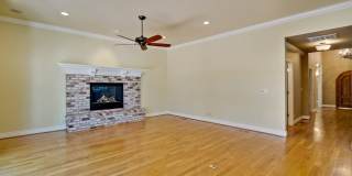Stunning two-story spacious home on tranquil tree-lined street. Gallery 32