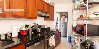 Nicely renovated 3 bed in a prime location next to the Green Line. Gallery 1