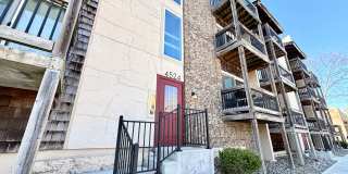 Top-Floor Plaza Condo with Vaulted Ceilings  Dual Balconies Gallery 1