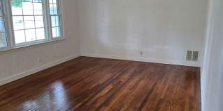 Large 2BD/1BA with tons of Bonus space and fenced in yard Gallery 1