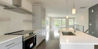 Stunning South End end unit townhome in the modern and amazing Southpoint community. Gallery 20
