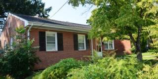 3 BR/ 1 BA Lakeside Three bedroom with large fenced yard and detached garage/workshop Gallery 1