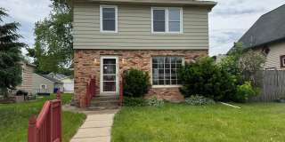 Charming 3 Bedroom Home With Fireplace and 2-Car Garage in Moline! Gallery 1