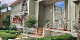 BEAUTIFUL 2 STORY TOWNHOUSE STYLE WITH A/C, WASHER/DRYER, POOL, AND ONE PARKING SPACE Gallery 1