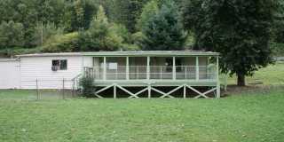 Columbia Riverfront Home with 1 Acre of Landscaped Yard Gallery 1