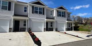 Beautiful New Construction 3 bedroom 2.5 Condo   with garage- Water, trash & sewer incuded! Gallery 1