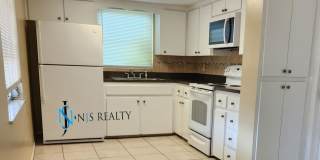 Beautiful 2/2/1 1150 Sq. Ft. with BONUS ROOM!!... tile & luxury plank flooring, Frest paint and a large fenced in yard! Gallery 6