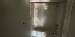 Charming 3-Bedroom Stone Home with Spacious Yard Gallery 9