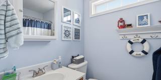 Step into a beautifully finished residence designed with an open and inviting layout that seamlessly connects each living space. Gallery 25