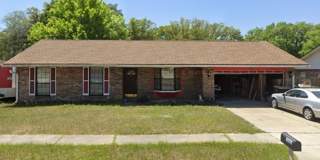 Welcome to this inviting 4-bedroom, 2-bathroom home. Gallery 1