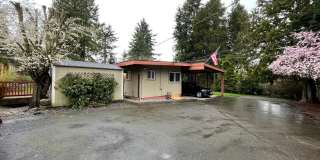 Spacious 4 Bed / 3 Bath Remodeled Rambler | Large Yard + Outbuildings + Minutes to Marina Desirable Des Moines Location Gallery 1