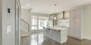 Stunning South End end unit townhome in the modern and amazing Southpoint community. Gallery 12