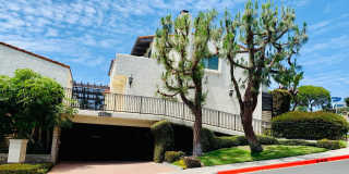 Unbeatable Location! Ocean View two bedrooms and two bathrooms two story condo with gated underground parking. Gallery 1