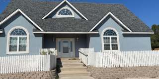 Large home with bonus room in Enchanted Lands Area! Gallery 1