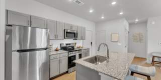 Step Right Up — Move In for Just $99 When You Sign by 8/31! | Brand-New 2-Bed, 2-Bath Apartments Near the U of A Gallery 23