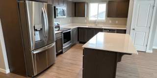 3 bed/2 bath rambler style home! Attached garage, fenced back yard & A/C! Gallery 1