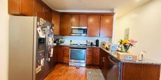 HUGE 2 Bedroom + Bonus Room + HUGE Deck + Covered Parking Gallery 1
