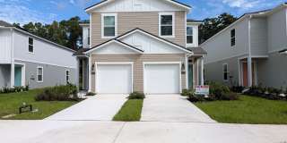 NOW LEASING - NEW 2026 VILLA CONSTRUCTION!! 3/2.5/1 with premium finishes in the a new development community of in Hansen Creek - conveniently located just off I-295 and Lem Turner. Gallery 1