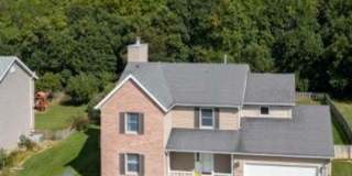 Charming 4BR, 2 and 1/2 Bath House in Dunlap Gallery 1