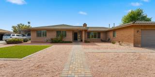 Welcome to this beautiful 4-bedroom, 3-bathroom home in Tempe Arizona! Gallery 1
