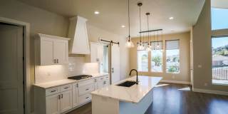 COMING IN JULY - Beautiful modern 5 bedroom, 3 car garage house for rent Gallery 9