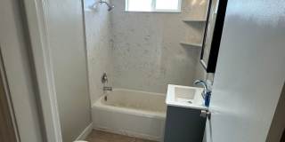 BEAUTIFUL UPDATED DUPLEX 2 BED & ONE BATH! Gallery 14