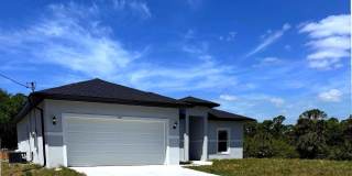 New 4 Bed / 2 Bath / 2 Car Garage Family Retreat in Desirable Lehigh Acres! Gallery 3