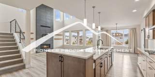 Breathtaking Pikes Peak Views in Desirable Wolf Ranch - 4 bedroom, 3 Full Bath, Office and Loft, with 3 car tandem garage Gallery 1