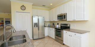 2/2 BEAUTIFUL COACH HOME ** SPANISH WELLS GOLF AND COUNTRY CLUB COMMUNITY  ** COMMUNITY POOLS ** Gallery 16
