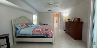 FURNISHED SHORT TERM RENTAL - 3 Bed / 2 Bath - Single Family Pool Home - $5,000/month ** Heated Swimming Pool **Canal View Gallery 23