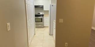 Great 2/2 condo in Pershing point Lake view  with updated Flooring Gallery 6