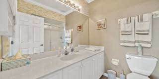 first-floor unit featuring a 2 bedroom, 2 bath fully furnished Gallery 17