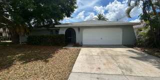 Freshly painted interior and new carpet in living room spacious home off Country Club Blvd Gallery 1