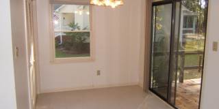 3BR/2BA Gem of a Home Nestled in a Premier Gated Community! Swim, Golf, Play Tennis! Gallery 1