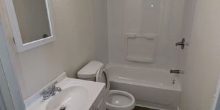 Ground Level 2 Bedroom, 2 Bath apartment. New flooring and paint. Tenant pays electric and natural gas. Water, Sewer, Trash included with monthly rent. Apply online at Homeboundprops.com Gallery 1