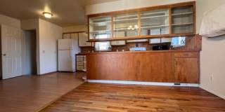 Bi-Level House w/ Massive Backyard, Storage, & Character! Gallery 8