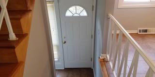 Cozy 3 bedroom 1.5 Bathroom Townhouse! Hardwood Throughout! Parking Included In Rent! Available for a June Move In! Gallery 16