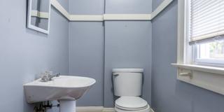 Charming 3BR Home with Classic Woodwork, Porch & Bonus Attic Space Gallery 9