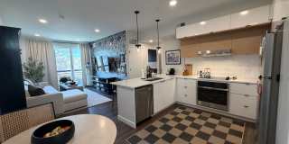 Top‑Floor Corner Condo with Downtown Views — Stylish, Pristine, and Steps From Everything Gallery 1