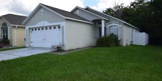 This charming 3 Bedroom, 2 Bath Single Family Home For Rent at 2216 Phonecia Ct. Orlando, FL 32837 Gallery 1