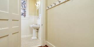 Stunning Tudor-style 4BR/3.5BA home in a prime, unbeatable location! Gallery 14