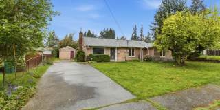 Cozy 4-Bedroom Home with Wood Stove & Large Backyard in Mountlake Terrace Gallery 1