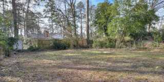 2 Bed/1 Bath just minutes from Augusta University and Surrey Center, featuring granite countertops, stainless steel appliances, and a private yard. Gallery 4