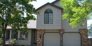 3925 NW 166th Drive ~ Spacious Tri-Level Home in Bethany Gallery 1